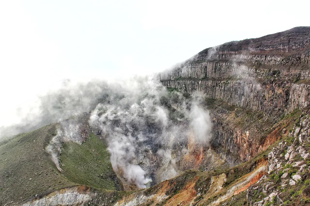 Kawah Gunung Gede berasap dilihat dari puncak Gunung Gede